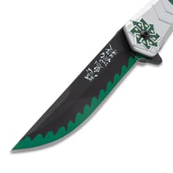 Close-up of knife blade with green edge and symbols