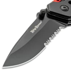 Close-up of Ridge Runner knife blade with serrated edge
