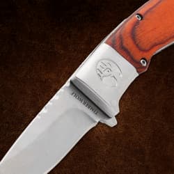Close-up of Timber Wolf knife blade and wood handle