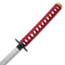 Close-up of katana handle with red and white wrapping