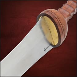 The Roman Mainz Pattern Gladius is shown house in its brown leather scabbard with straps and brass colored detailing.