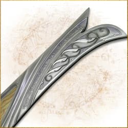 Close-up of a sword's hilt with intricate runic engravings