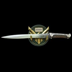 Green and gold display wall mount featuring the hawk sigil of House Atreides with the knife resting on gold prongs.