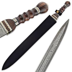 Gladiator sword secured in black leather sheath with detailed view of heartwood handle and Damascus steel blade.