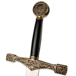 “Excalibur” and “King Arthur” are engraved above the dragon design of the pommel, which compliments the ornate guard.