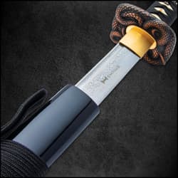 Katana hardwood handle wrapped in black cord and white faux rayskin with menuki and snake designed tsuba