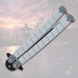 Closed butterfly knife with scenic background
