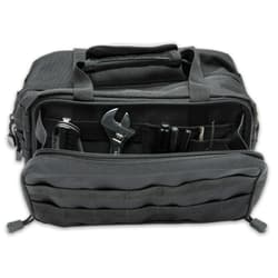 The toolkit bag has a large, main zippered compartment that contains individual slots to store tools and other gear