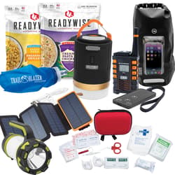 Camping gear including food, lantern, radio, and first aid kit