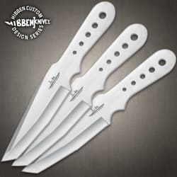 Three Hibben throwing knives with hole-punched handles