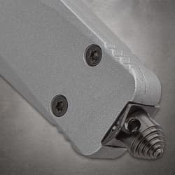 Close-up of tactical knife handle with screws