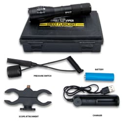 The flashlight with its case and accessories