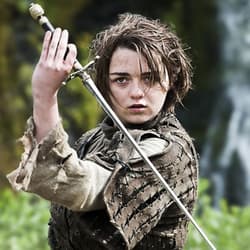 Game of Thrones character Arya Stark shown holding the Needle sword.