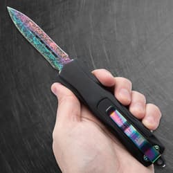 Full image of the OTF Knife being held in hand.