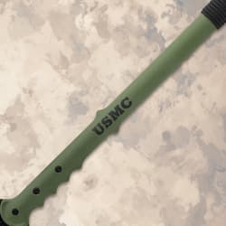 Close-up of green spear shaft with USMC logo