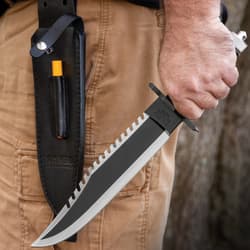 Rambo II First Blood Fixed Blade Knife Sawback blade with sharp teeth along the spine and pointed clip-point tip.