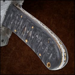 The blade with sawback serrations