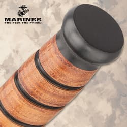 Close-up of knife handle with black pommel