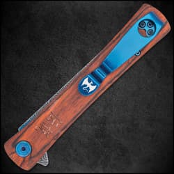 Open slim pocket knife with bloodwood handle engraved with japanese symbols, metallic blue accents, and a grey upswept blade with a raised raindrop pattern.