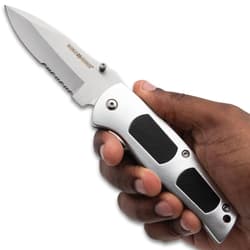 Ridge Runner Serrated Knife in hand