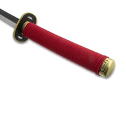 Detailed view of katana's red handle and guard