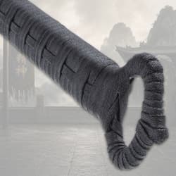 Close-up of sword handle wrapped in black cord