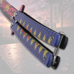 Close-up of butterfly knife handle with intricate design
