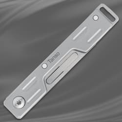 Folded Tanso scalpel knife on a gray background