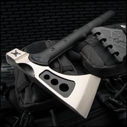 Axe on black tactical gear background