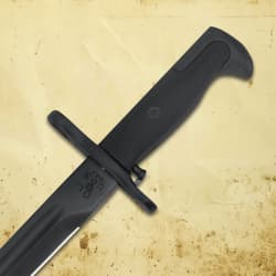 Close-up of bayonet handle on a textured background