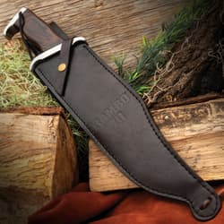 Rambo 3 Fixed Blade Knife Secure Sheath Dark durable and embossed with the "Rambo III" Logo.