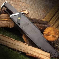 Rambo 3 Signature Edition Knife secured in black leather sheath with visible stitching