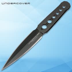 Black dagger with holes on blue background