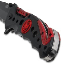 Close-up of knife handle with red accents