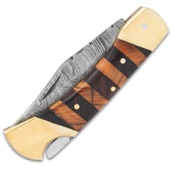 The Timber Wolf Copperhead Pocket Knife has a banded wooden handle