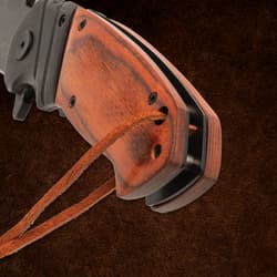 Close-up of Timber Wolf knife handle with lanyard