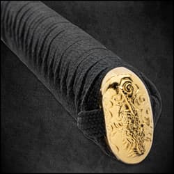 The colossal, full-tang 36” Damascus steel blade is expertly hand-forged by seasoned swordsmiths using centuries-old techniques