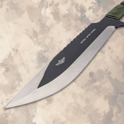 Close-up of knife blade with logo