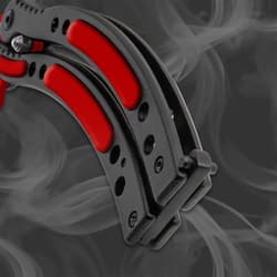 Close-up of butterfly knife handle with red accents