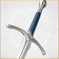 Close-up of sword hilt with blue grip and engraved details
