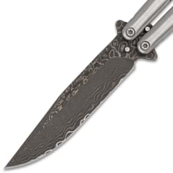Close-up of the Damascus blade on a butterfly knife