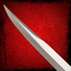 Close-up of Arabian Khyber Bowie Knife blade tip against red background