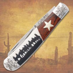 Closed knife with star and cowboy silhouette design