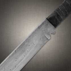 Close-up of machete blade near the handle