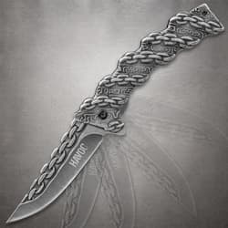 Open knife with chain design on blade and handle