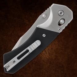 Close-up of silver blade on a folding knife