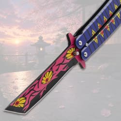 Butterfly knife blade with floral pattern, serene background
