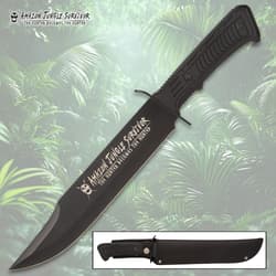 Black survival knife with jungle background