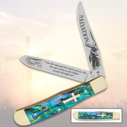 Pocket knife with abalone handle, cross inset, and etched blades