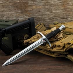Honshu dagger on tactical gear with wooden background